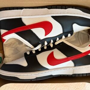 Nike Dunk Low Retro in Black and University Red. NWT